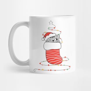 Cat in red sock with Christmas light. Mug